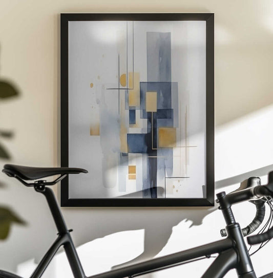 Blue Geometric 1 by Sally Ann Moss, black-framed artwork above a bicycle; layered blue rectangles with gold-toned blocks and fine lines.