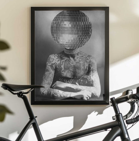 DISCO VINTAGE PORTRAIT by The Art Concept — black-framed canvas displayed behind a bicycle