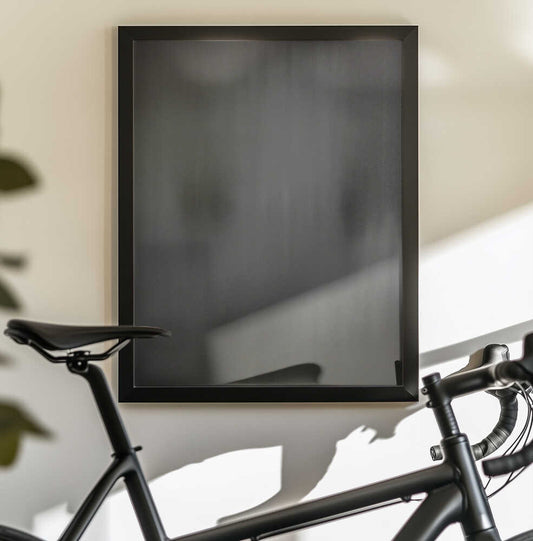 Of Otherworldly Terrain II by Mark Russell Jones — black-framed canvas displayed behind a bicycle