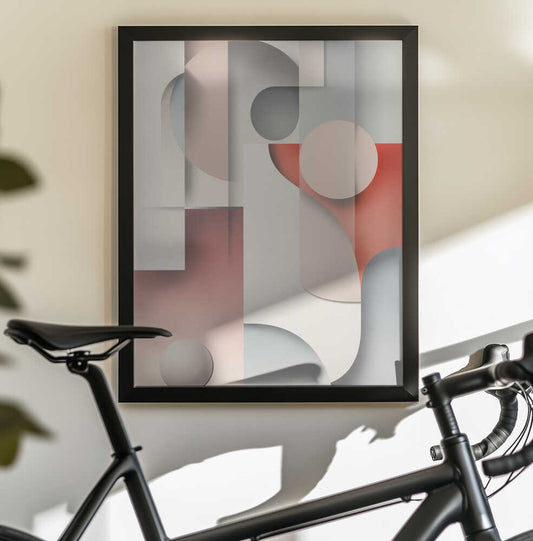 Poster Abstraction Art 005 by Rafal Kulik, black-framed artwork above a bicycle; soft pink and gray curved planes with floating circles and coral accents.