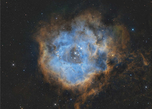 Rosette by Vikas Chander, front view of the artwork; a luminous blue cloud ring edged with warm gold tones in a dark star field.