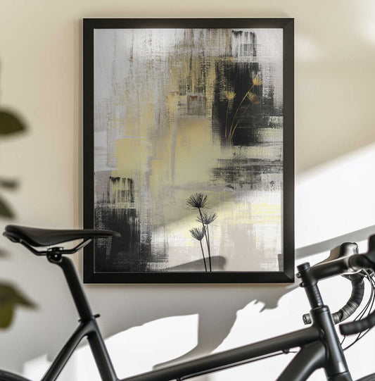 royal gold-2 by Sally Ann Moss, black-framed artwork above a bicycle; pale yellow and black abstraction with fine botanical stems.