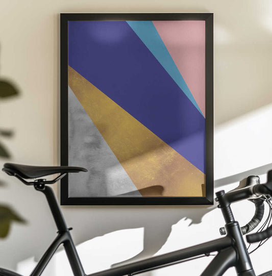 Texture geometry 3 by Vitor Costa, black-framed artwork above a bicycle; bold purple, blue and pink diagonal planes above gold-toned and gray sections.