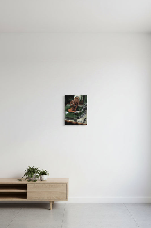 Canvas display in studio with a sand tone table top of left side of photo. Two small succulent plant on top in a white vase

