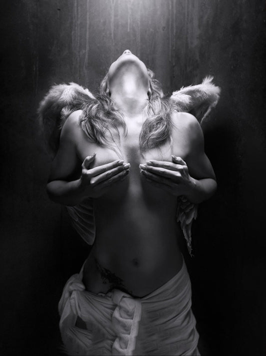 monochrome topless woman with angel wings