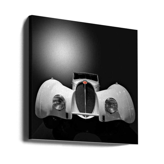 A White Bugatti by Roland Weber, gallery-wrapped canvas viewed at an angle; a white vintage Bugatti seen from the front against a dark background.