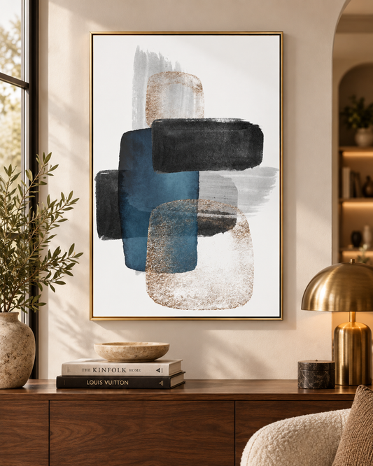 Blue & Grey | Modern Abstract Canvas Wall Art — gold-framed canvas beside a chair