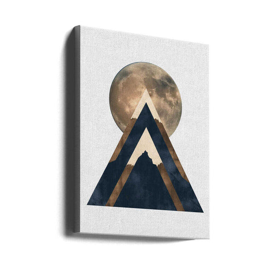 Bronze Moon by SHANDU, gallery-wrapped canvas viewed at an angle; a bronze-toned moon behind layered dark triangular mountain forms.