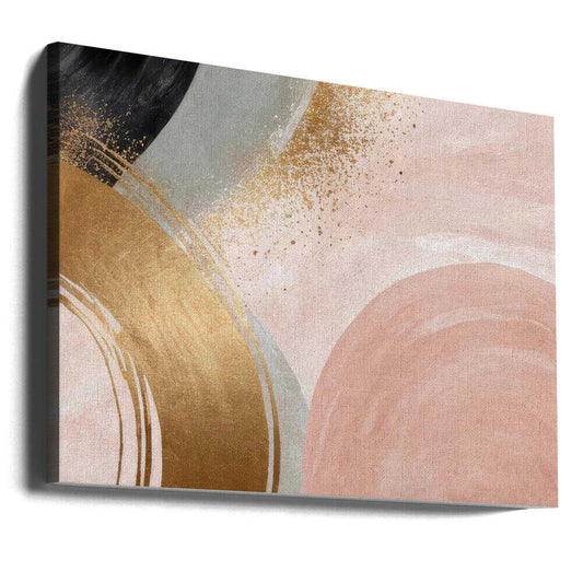 Circular Motion by Alpenglow Workshop, gallery-wrapped canvas viewed at an angle; broad blush, gold-toned, cream and gray arcs with scattered textured marks.