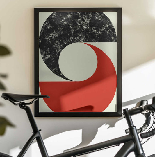 Contrast Crescents by Petr Strnad, black-framed artwork above a bicycle; a distressed black crescent and broad red curve surrounding a pale central circle.