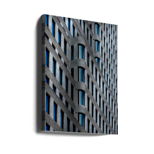 Curvaceous Facade by Stephan Rückert, gallery-wrapped canvas viewed at an angle; curved gray building facade with repeating blue-gray windows.