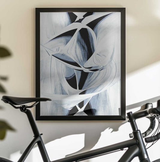 Dynamic Black And White Swirling Patterns by Christina Sillen, black-framed artwork above a bicycle; sweeping white ribbon-like curves over black forms with cool blue-gray shading.