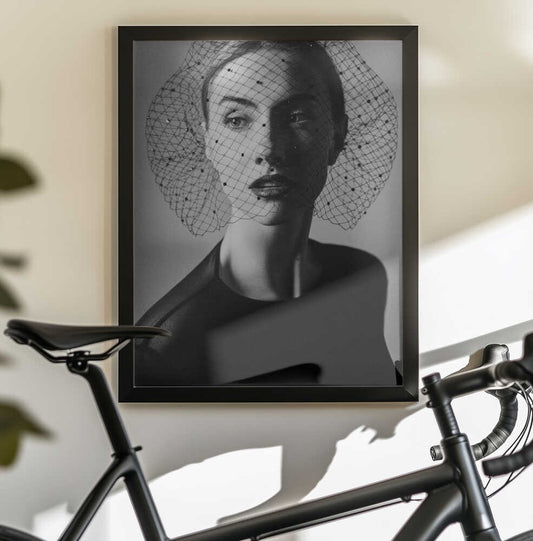 Ekaterina by Sima Bivolarska — black-framed canvas displayed behind a bicycle