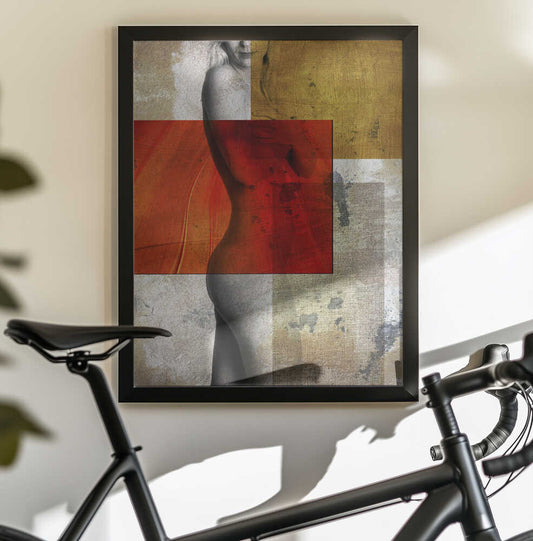 Emma by Rudi Jacobs, black-framed artwork above a bicycle; grayscale female figure layered with red and gold-toned blocks.
