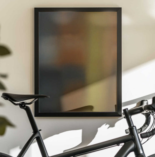 Euphoric Blaze by Mark Russell Jones — black-framed canvas displayed behind a bicycle