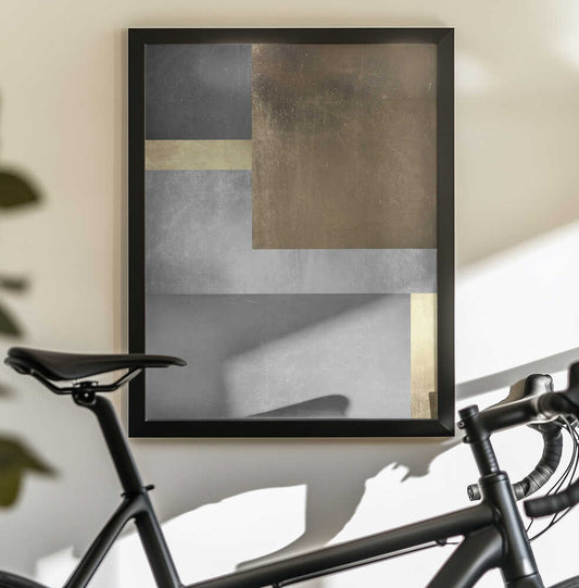 Gold and silver textures 3 by Vitor Costa, black-framed artwork above a bicycle; a large warm gold-toned rectangle overlapping gray blocks and a pale horizontal band.