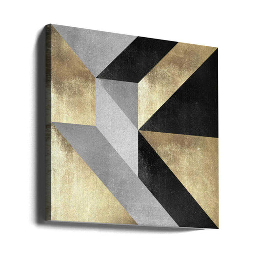 Gold Geometry by Vitor Costa, gallery-wrapped canvas viewed at an angle; intersecting diagonal gold-toned, gray and black geometric bands.
