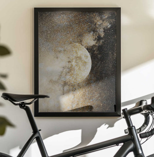 Honey Moon I by Gemma Bardot — black-framed canvas displayed behind a bicycle