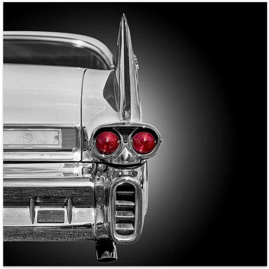 Red Lights by Roland Weber, front view of the artwork; the chrome rear corner and tall tailfin of a vintage car with two red taillights.