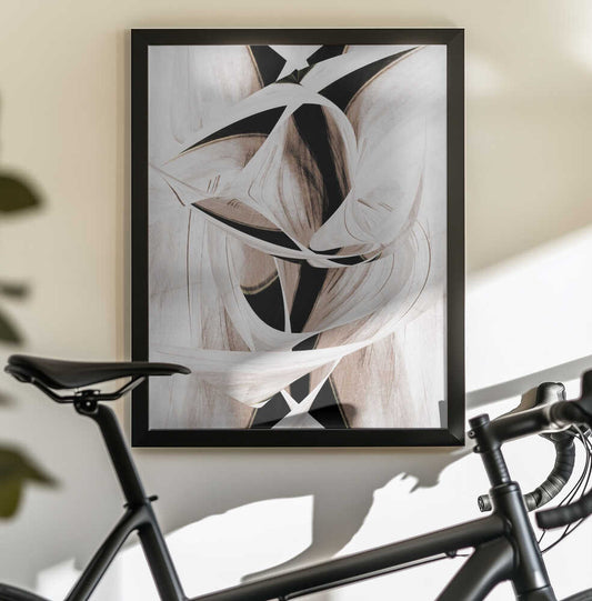 Silent Whirlwind by Christina Sillen, black-framed artwork above a bicycle; intertwined white and black sweeping forms with warm blush and taupe shading.
