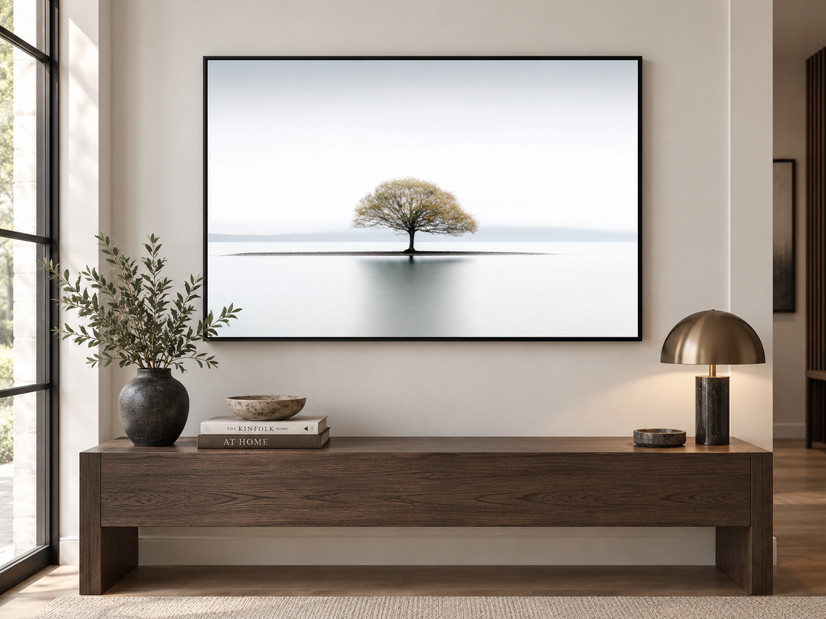 Still | Canvas Print | Minimalist Tree Landscape Wall Art — black-framed canvas above a console