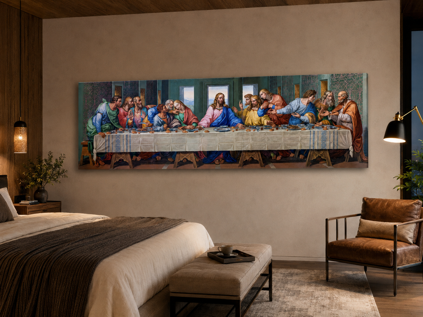 A large canvas print of Leonardo da Vinci's Last Supper displayed on a beige wall in a modern, warm-toned bedroom setting with a bed, leather armchair, and bedside lamps.