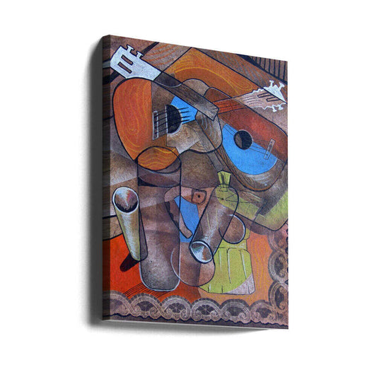 Two Guitars by Ricardo Maya, gallery-wrapped canvas viewed at an angle; two overlapping guitars above geometric vessels and patterned trim.