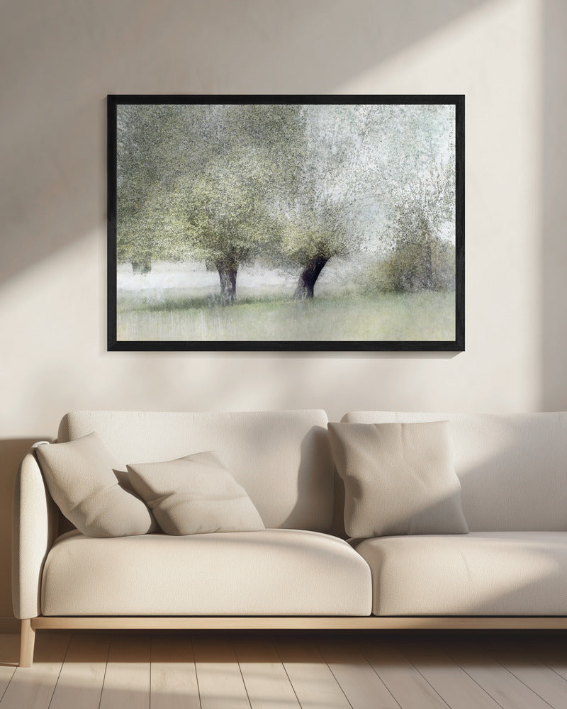 Young green by Nel Talen — black-framed canvas above a cream sofa