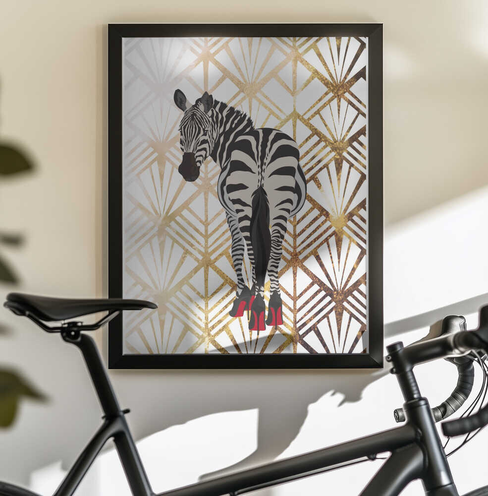 Zebra Heels Art Deco by Sarah Manovski, black-framed artwork above a bicycle; a zebra in red high heels against a pale gold-toned Art Deco fan pattern.